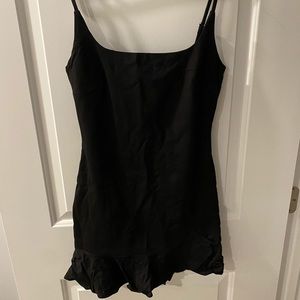 Black ruffle bottom bodycon mini dress